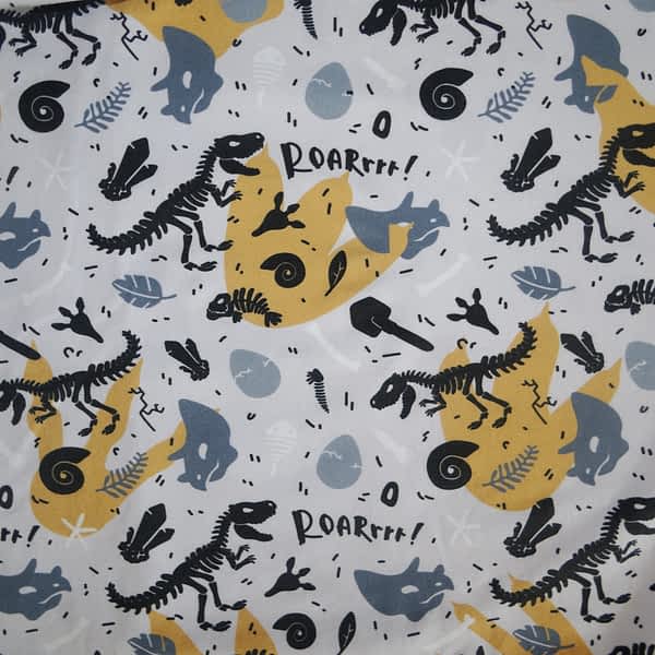 Bio-French Terry Stoff mit coolem Fossilien-Motiv, Dinosaurier - nachhaltiger, weicher Stoff ideal für Baby- und Kinderkleidung, für umweltbewusste mitwachsende handgemachte Kindermode, wie T-Shirt für Kinder, Langarmshirt für Kinder