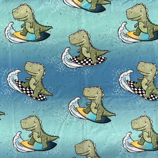 Blau-türkiser Jersey-Stoff mit surfenden Dinosauriern auf Wellen – perfekt für sommerliche Kinderkleidung wie Shirts, Shorts oder Beanies